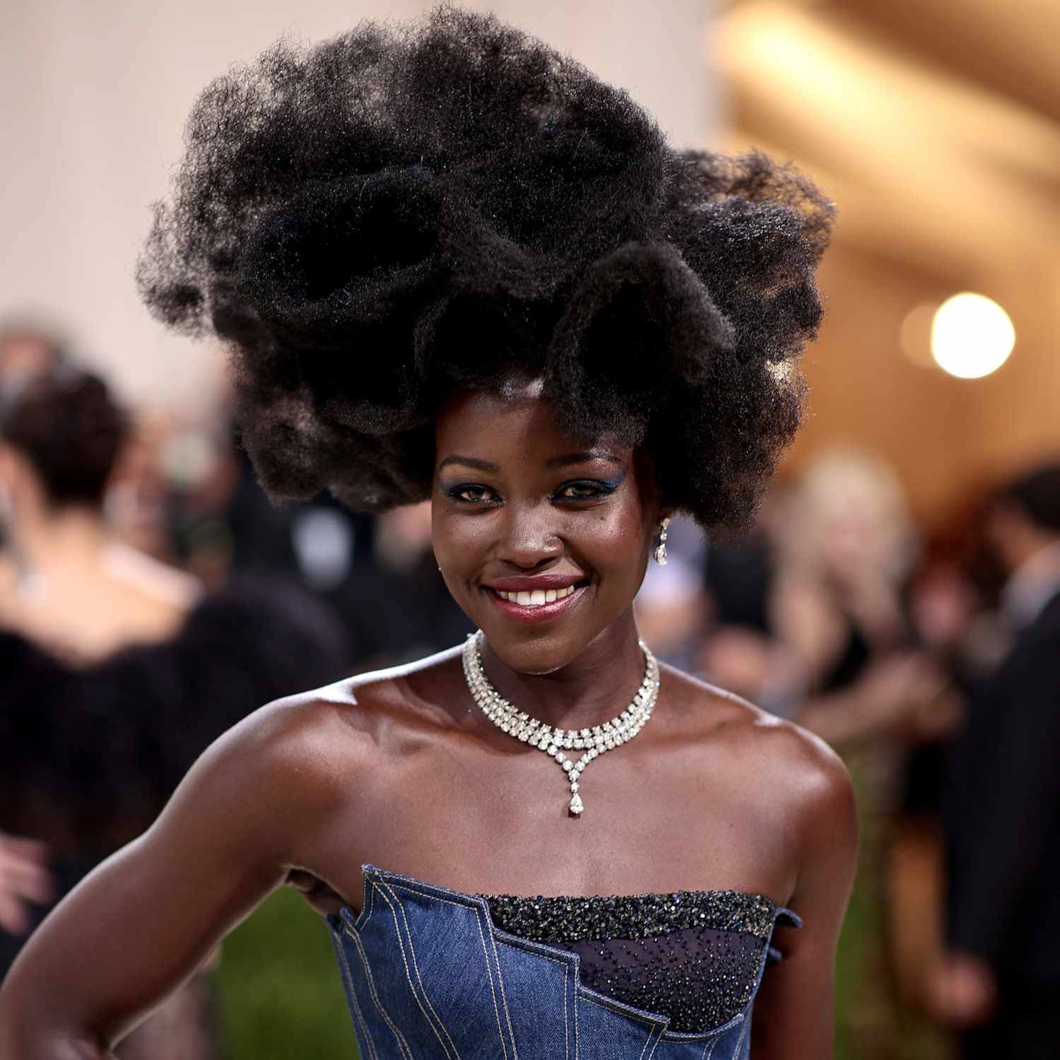 Lupita Nyong'o with a sculptural hairstyle at the Met Gala